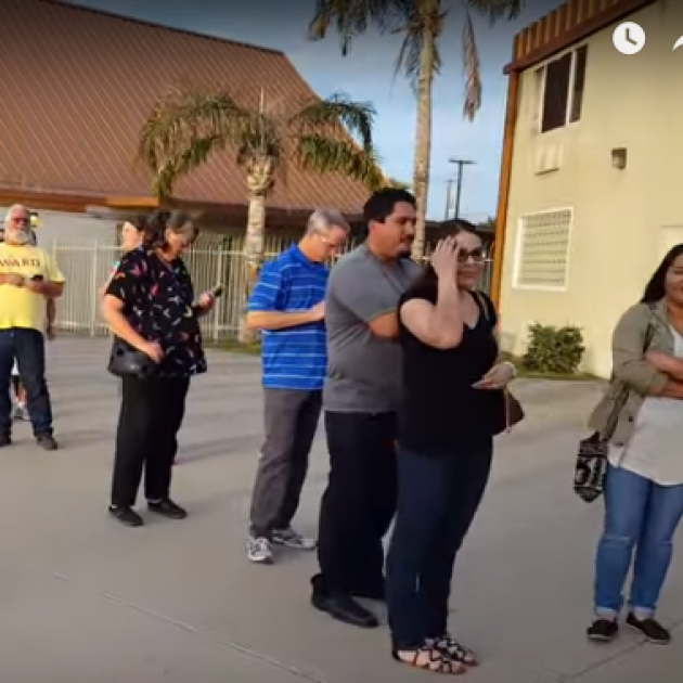 Line of people waiting to vote