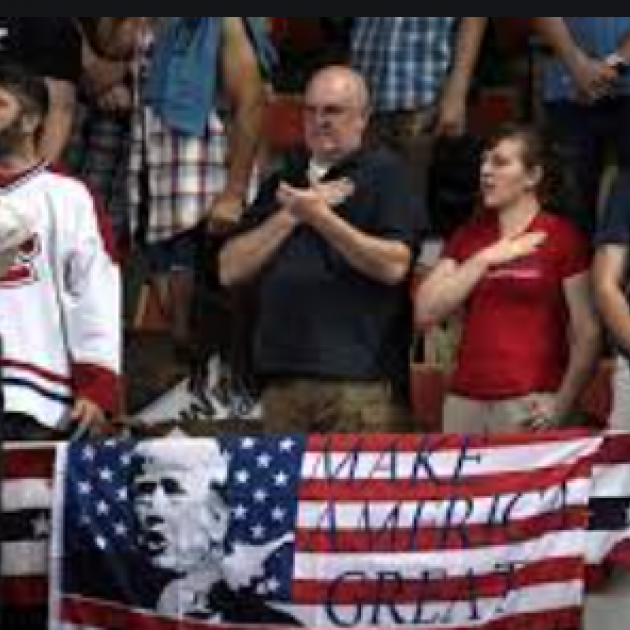 Protestors with MAGA flag