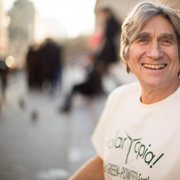 Harvey smiling with Solartopia shirt on