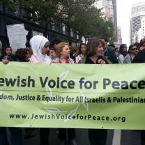 People holding a Jewish Vices for Peace banner