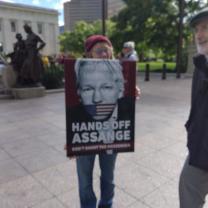 Woman holding sign