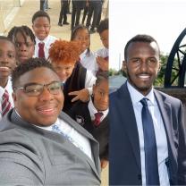 Two black men in suits smiling