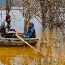 Two people in a rowboat