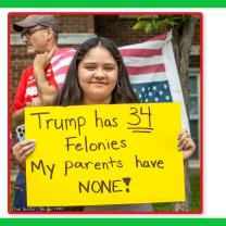 Woman with sign saying Trump has 34 felonies, my parents have NONE