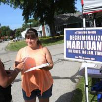 Photo of people with political sign