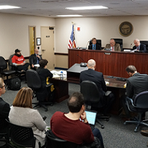 People in what looks like a courtroom